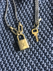 one of our best sellers— the lv lock & key necklace